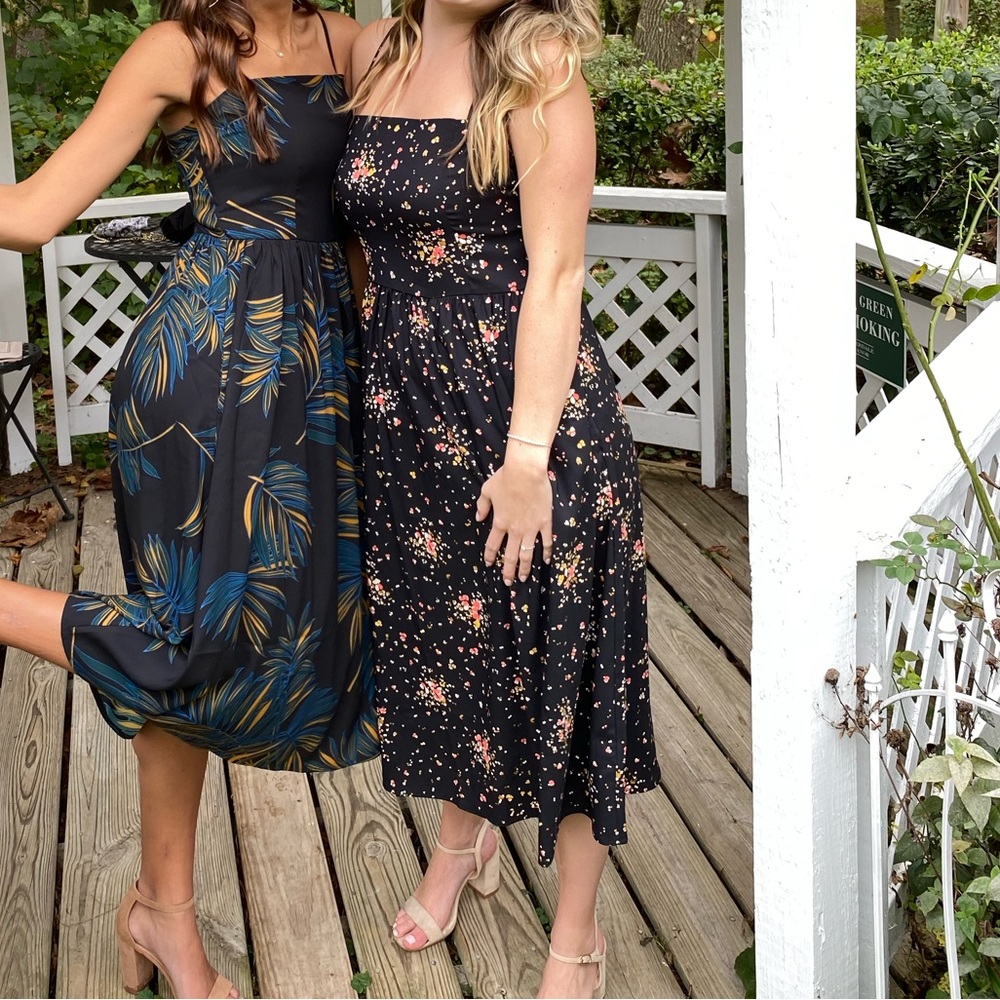Black dress with yellow, red, white pattern